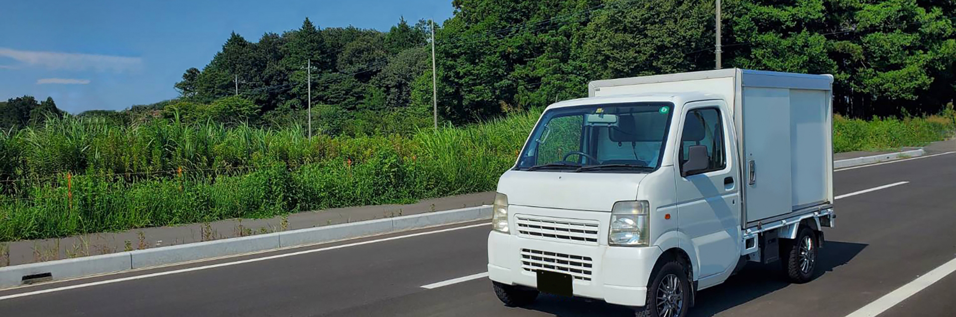 走る軽トラック